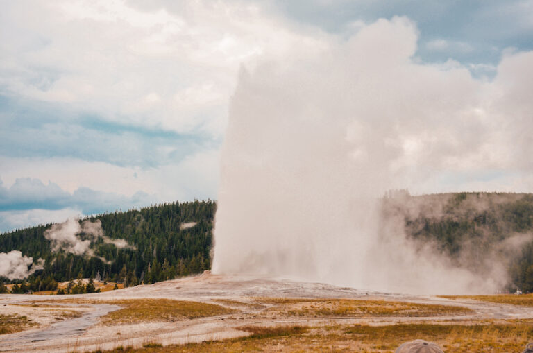 Old Faithful is a huge geyser which is one of the most popular stops in Yellowstone