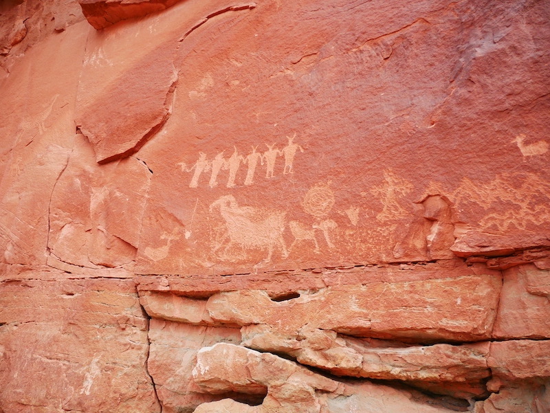 Moab is home to many ancient petroglyphs that can be found in places like Newspaper Rock Moonflower Canyon and Wolf Ranch