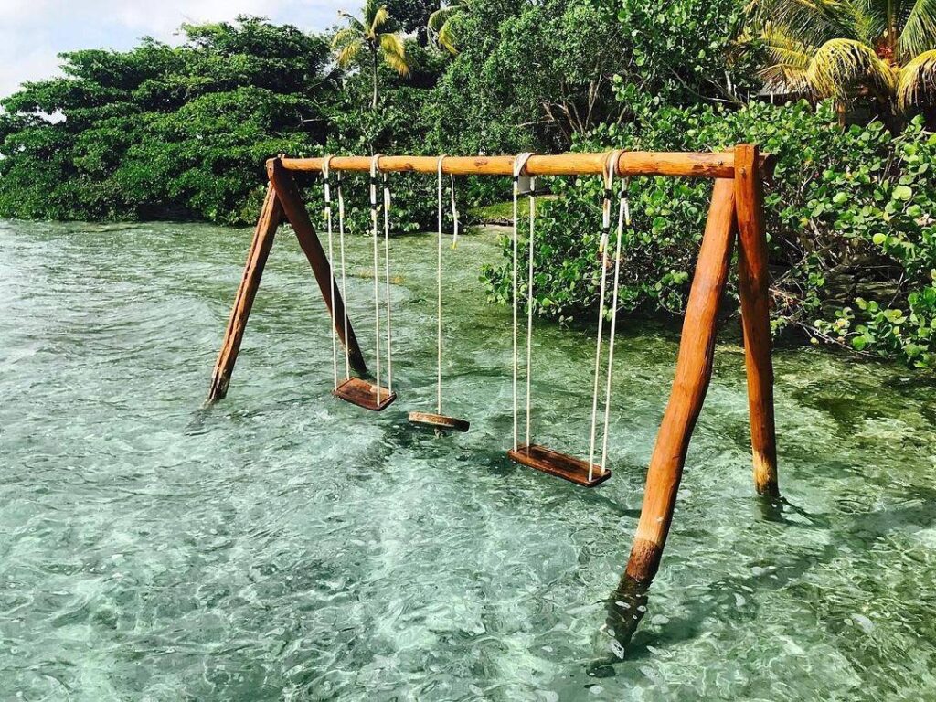Many Bacalar hotels has wooden piers and swings above the water. Villa Marilu is one of the best Bacalar hotels on the water.