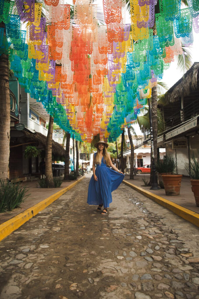 Taking photos on Calle Delfines is one of the best free things to do in Sayulita